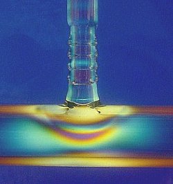 A glass T shows unannelaed stress when viewed with a polariscope